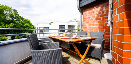 Wohnen im Herzen von Gr&ouml;mitz!
Hochwertige 2-Zi-Whg. mit Dachterrasse u. inkl. Tiefgaragenstellplatz